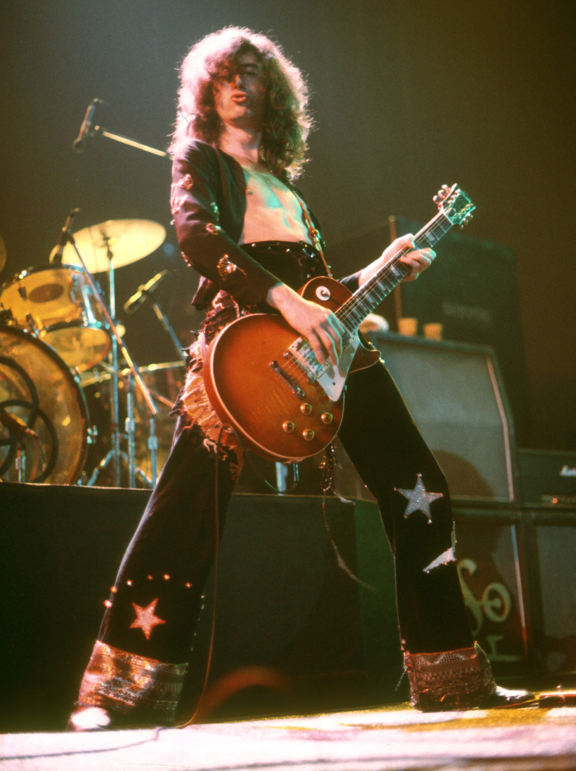 LOS ANGELES - MARCH 24: Jimmy Page of the rock band 'Led Zeppelin' performs onstage at the Forum on March 24, 1975 in Los Angeles, California. (Photo by Michael Ochs Archives/Getty Images)